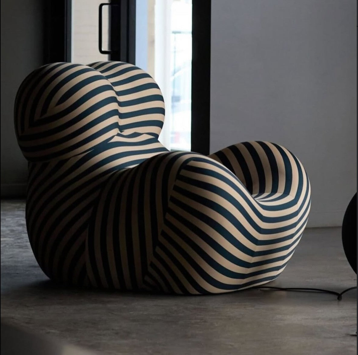 NEORA — Sculptural Lounge Chair with Footrest